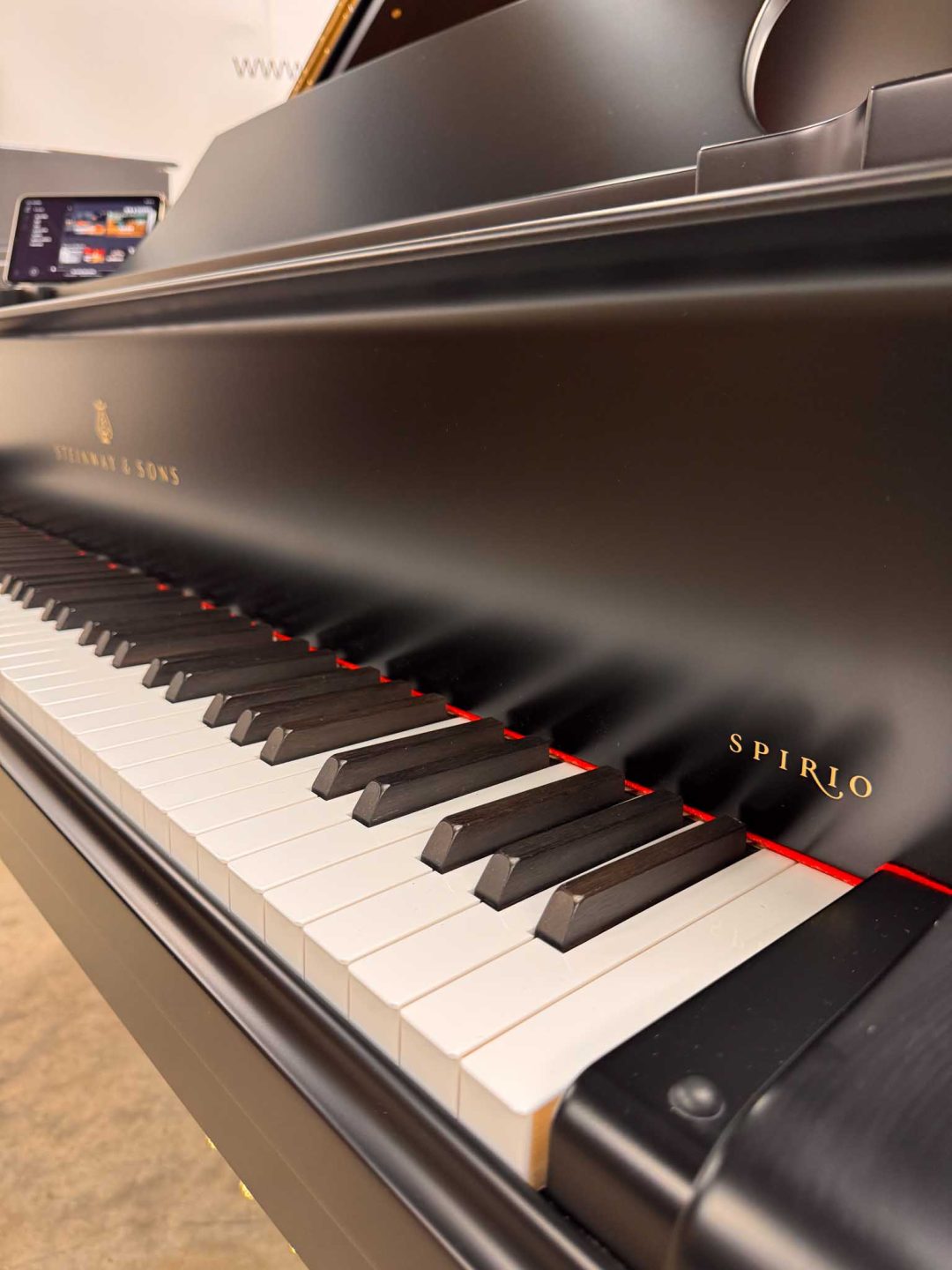 Steinway Model B grand piano Spirio logo.